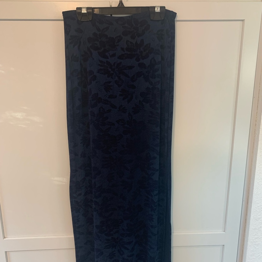 Blue long skirt with slits up each side.